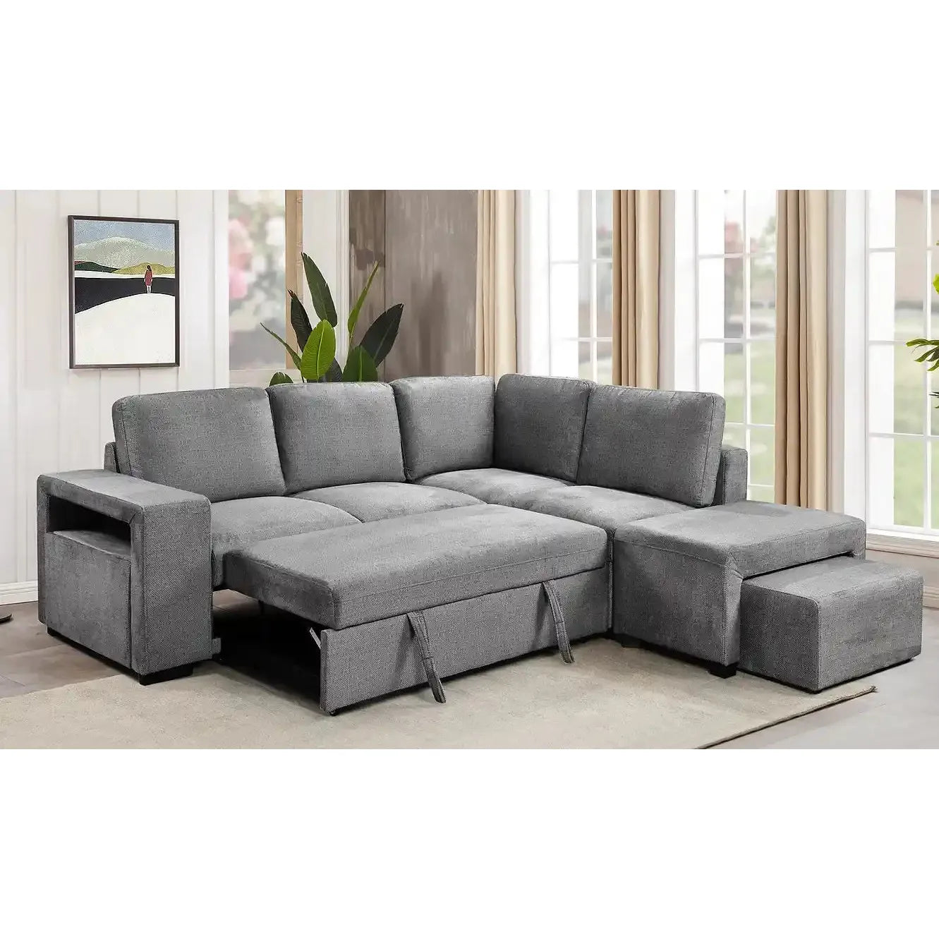 Gray sectional sofa with storage ottomans for living room setting.