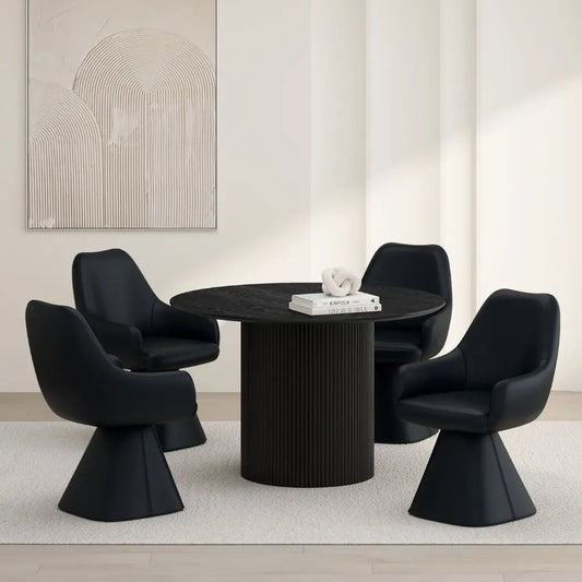 Modern black dining table with four matching chairs in a minimalistic room.