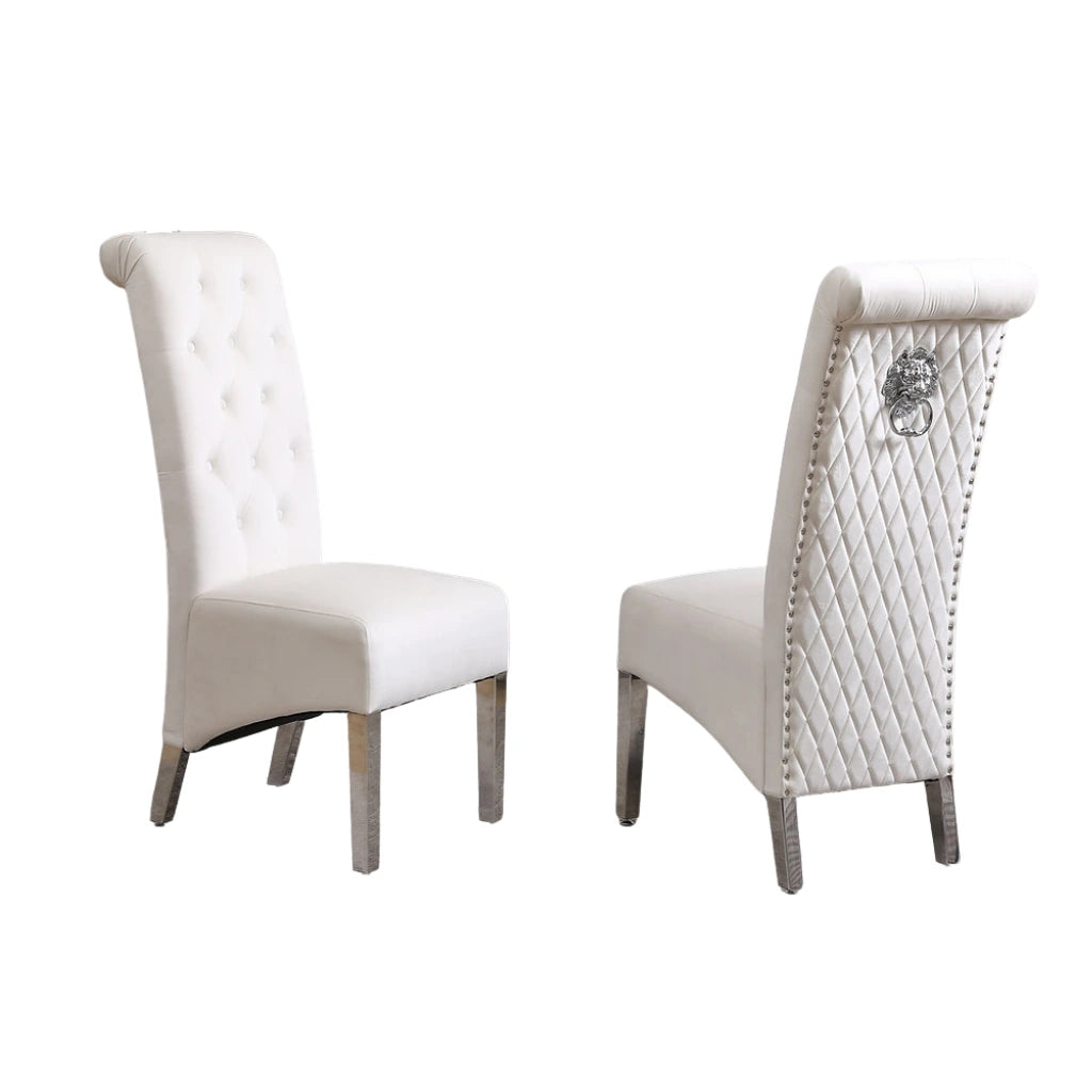 Two white chairs with decorative backrests