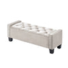 Cream tufted bench with black legs 