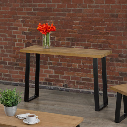 Wooden table with black legs 
