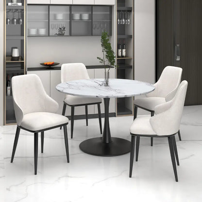 Dining table with four chairs in a modern kitchen setting