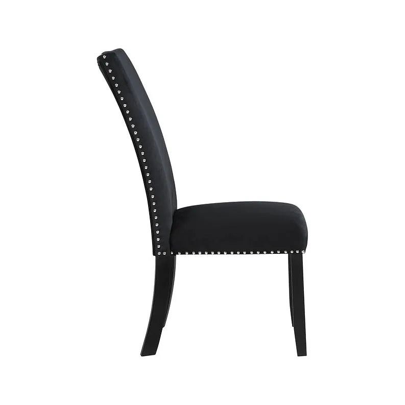 side profile of black velvet dining chair