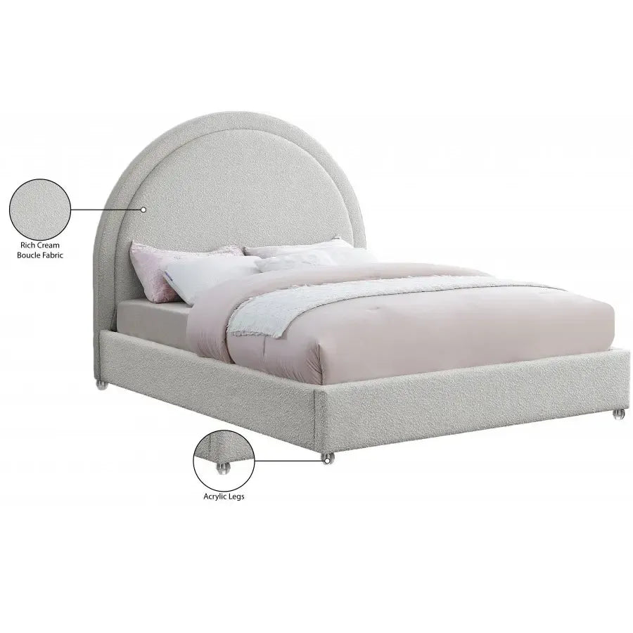 contemporary queen bed in cream bouclé