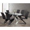 Modern dining set with a glass table and black dining chairs