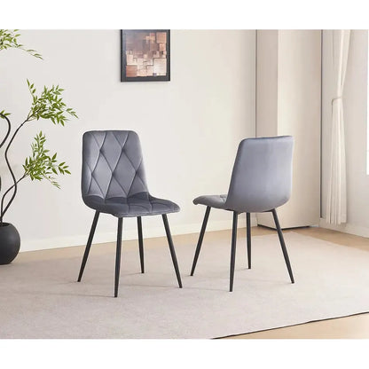 Two grey velvet dining chairs for sell in Montrel