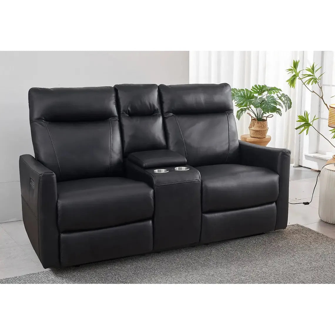 Black leather sofa with cup holders