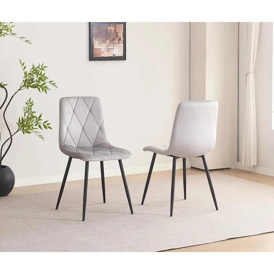 Two light  gray dining chairs 