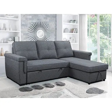 Gray sectional sofa in a living room setting 