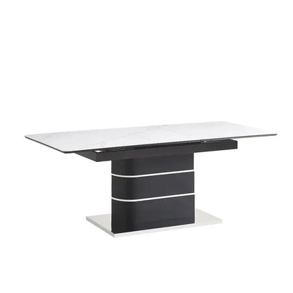 Modern dining table with black base and white marble top