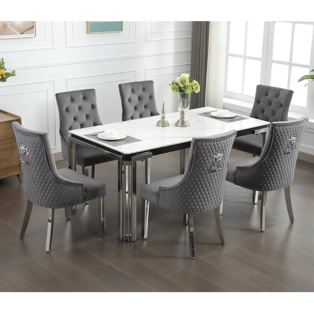 Dining room set with a white marble top dining table and gray chairs 