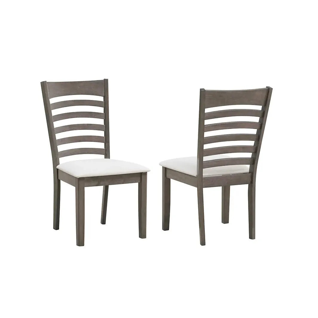 wooden dining chairs with slatted backrests and white cushioned seats