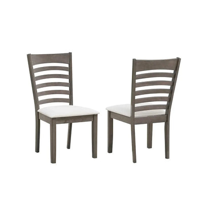 wooden dining chairs with slatted backrests and white cushioned seats
